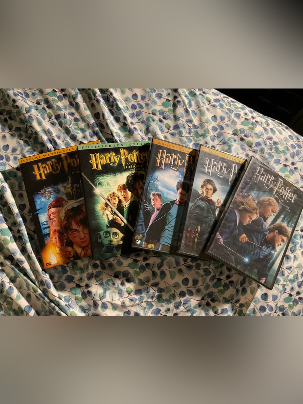 Firm Price New Warner Bros. Harry Potter DVD Movies 1-4 and 7th Movie.